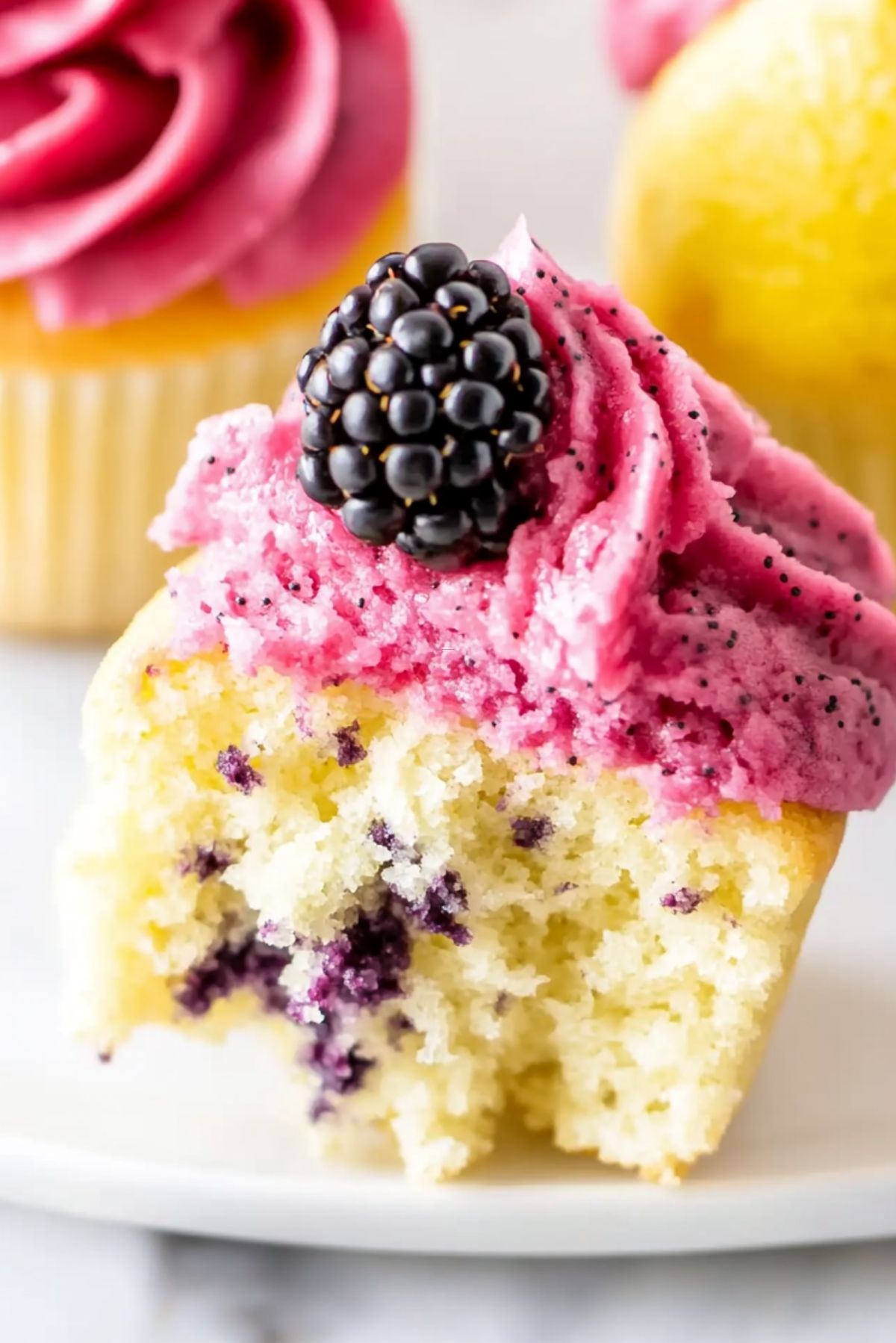 Lemon Poppy Seed Cupcakes with Blackberry Frosting: A Zesty and Berry Sweet Delight
