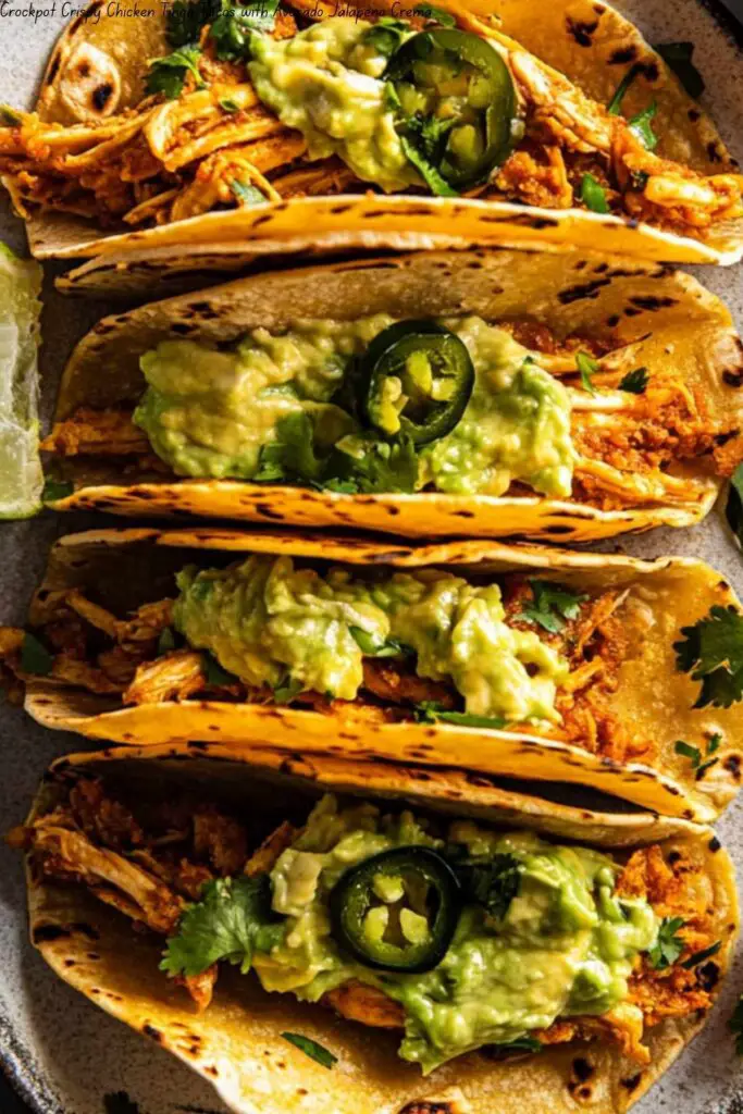 Crockpot Crispy Chicken Tinga Tacos with Avocado Jalapeño Crema. 4 Crockpot Crispy Chicken Tinga Tacos with Avocado Jalapeño Crema.
