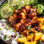 Chili Crisp Chicken Mango Cucumber Rice Bowl. 5 Chili Crisp Chicken Mango Cucumber Rice Bowl.