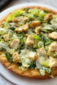 Viral Chicken Crust Caesar Salad Pizza
