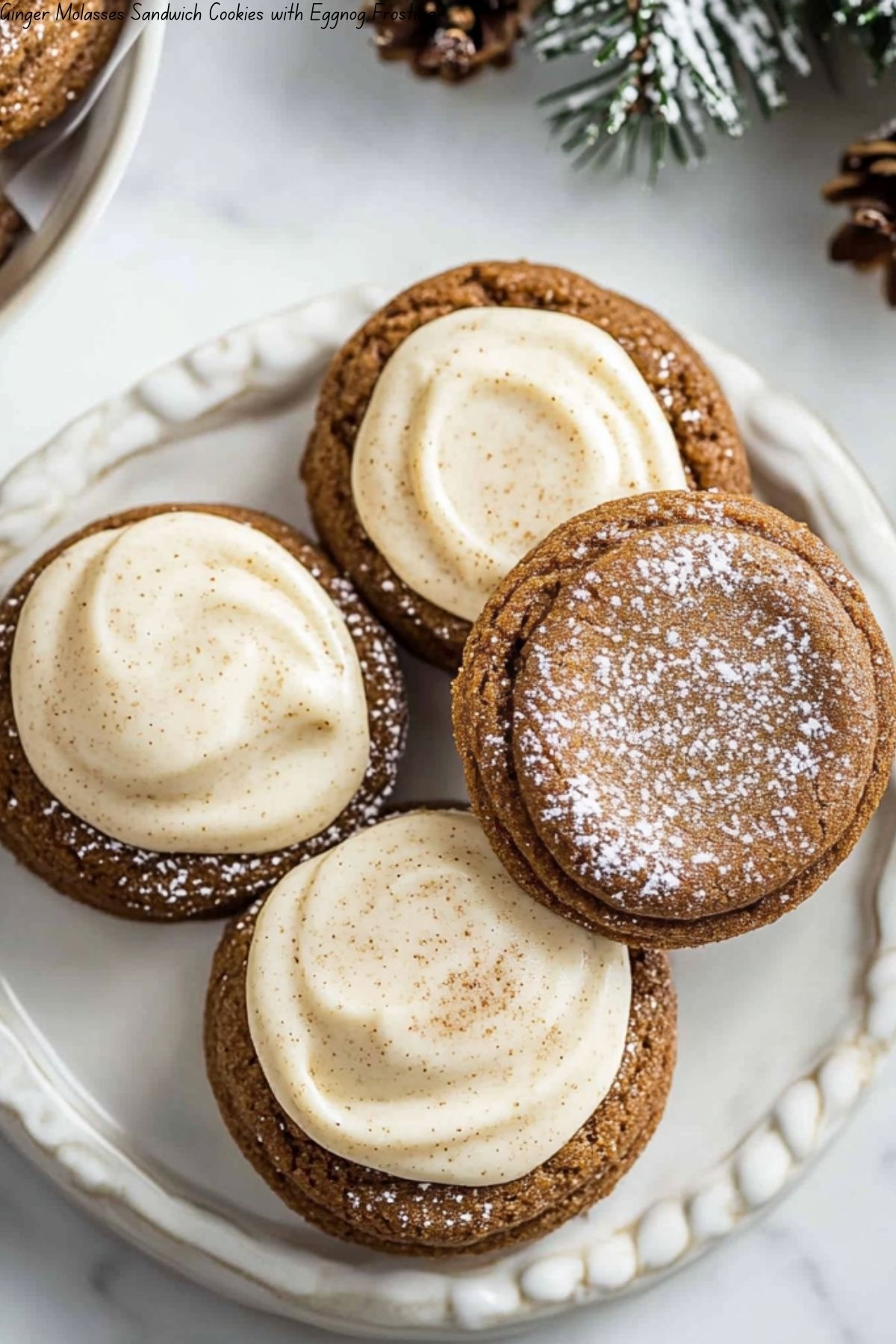 Ginger Molasses Sandwich Cookies with Eggnog Frosting