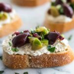 Mixed Olive and Whipped Feta Crostini